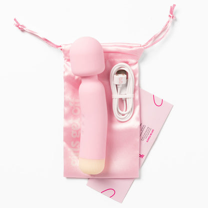 Close up of Wanda wand vibrator showing broad silicone head and simple control buttons.